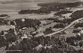 Flygfoto över Va Bodarna. Postgånget 3 mars 1954
